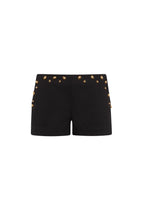 SHORT NEGRO CON TACHAS