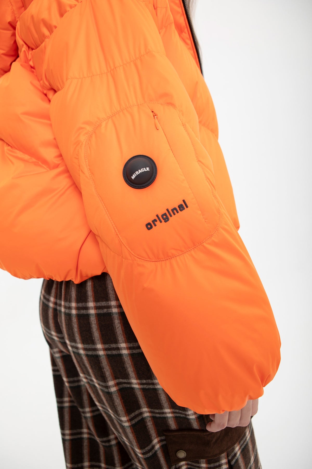 FEATHERS SHORT ORANGE