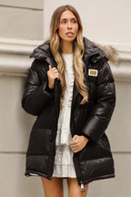 PLUMAS LARGO OVERSIZE NEGRO
