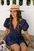 VESTIDO VOLANTE CON OJETES