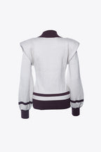 CREAM SHOULDER PAD SWEATER WITH CREST